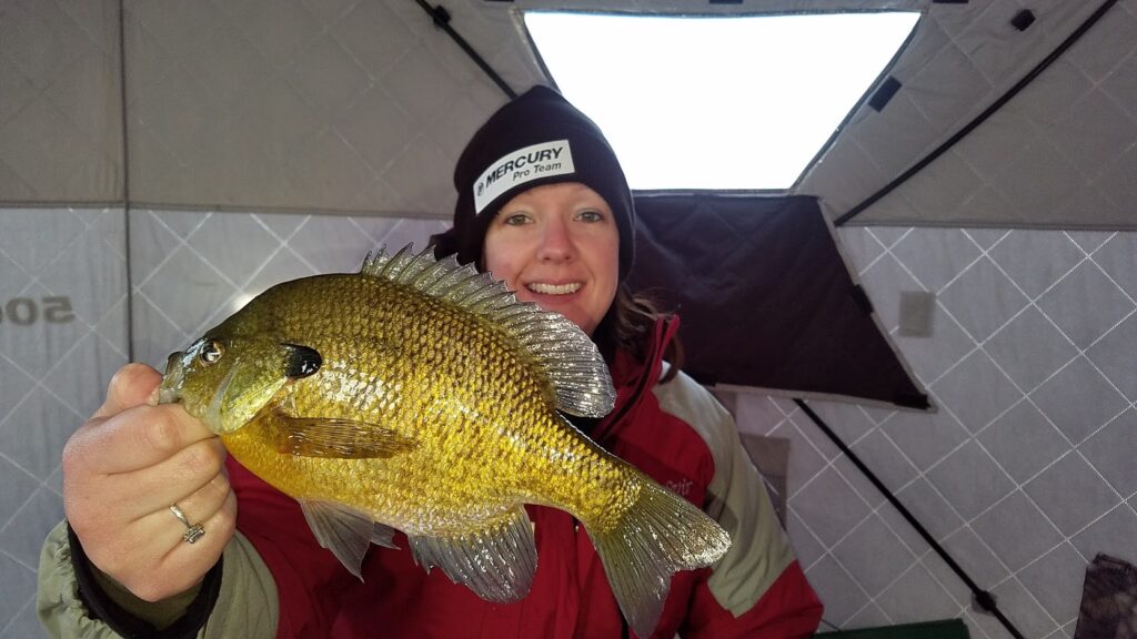 women with caught fish