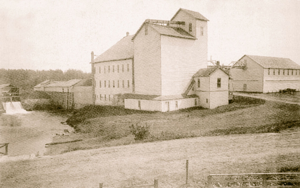 The R.L. Frazee flour mill, elevator, dam and warehouse, circa 1895
